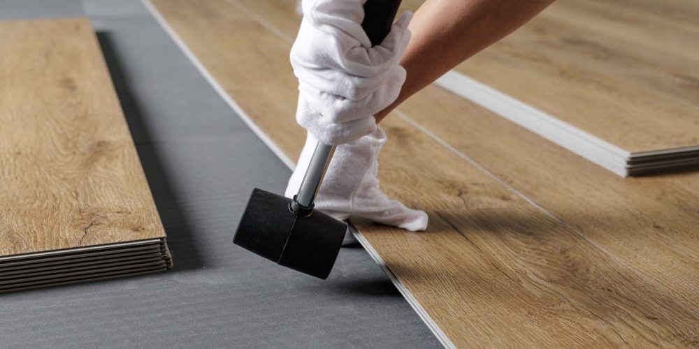 close-up-aligning-spc-vinyl-plank-on-underlayment-2026-01-09-12-13-26-utc