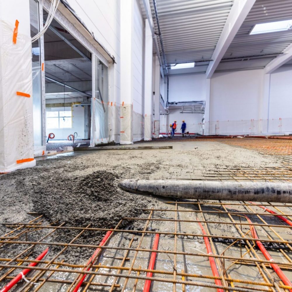 concrete-screed-on-floor-heating-in-a-new-warehous-2026-01-09-08-38-52-utc