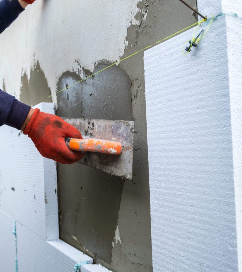 construction-worker-installing-styrofoam-insulatio-2026-01-07-02-13-45-utc